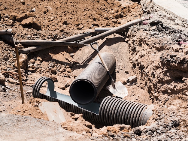 Construction site with dug out pipes