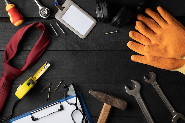 Construction tools on table, space for text