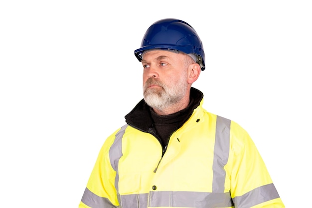 A construction worker in a blue hat and yellow hiviz coat on white background with cpace for text