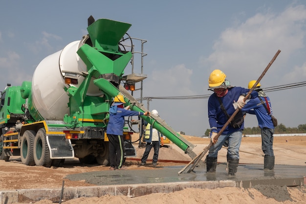 A construction worker fixing steel bar at construction site