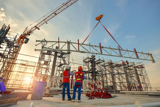 Construction worker truss installation 