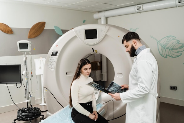 Consultation about spine CT scan for assess for herniated disk tumors extent of injuries blood vessel malformations Computed tomography CT scan process for examination of spine