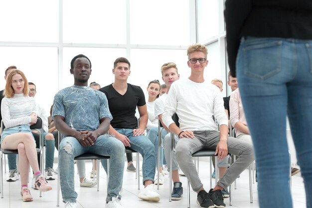 Photo contact group of young people sitting in the conference room