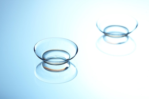 Photo contact lenses on blue background