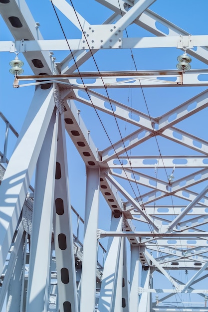 Contact network of the railway on the crossbeams of the bridge