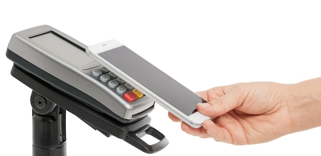 Contactless payment with a smartphone using a payment terminal on a white background