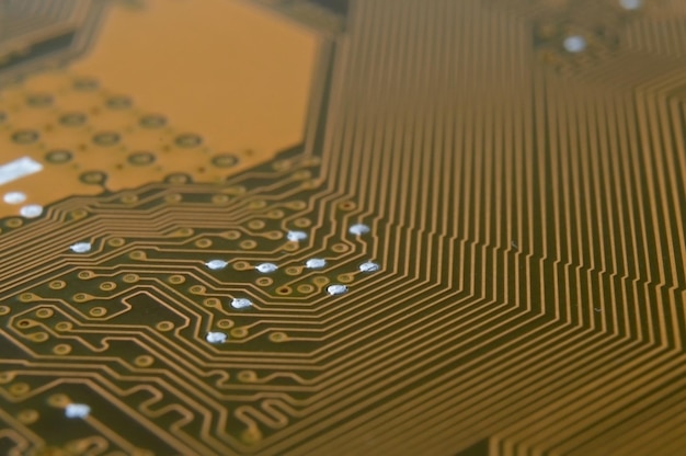 Contacts on the surface of the motherboard from the computer closeup