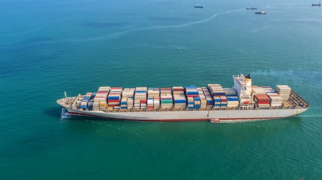 Container ship in export and import business and logistics. 