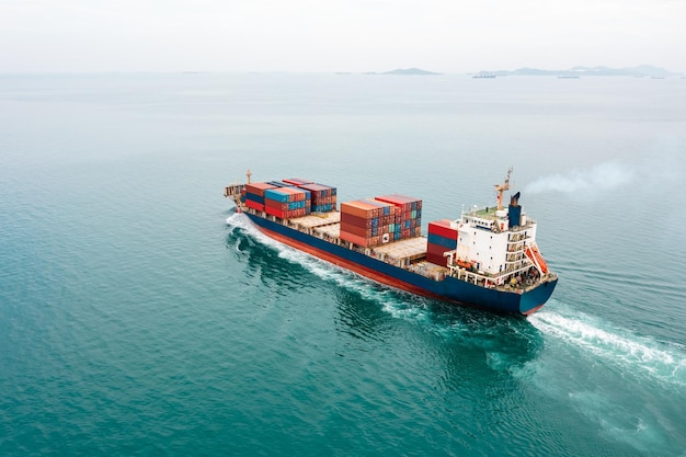 Container ship full speed sailing in sea for transporting cargo logistic import and export goods