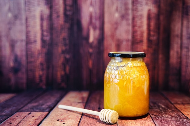 container with bee honey