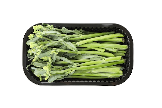 Container with broccolini isolated on white background