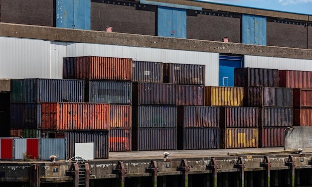 Containers old rusted at harbor of Rotterdam Netherlands Logistics business cargo loading unloading