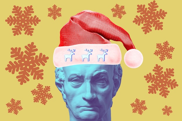 Contemporary art collage with head of ancient statue wearing christmas hat concept of holidays party