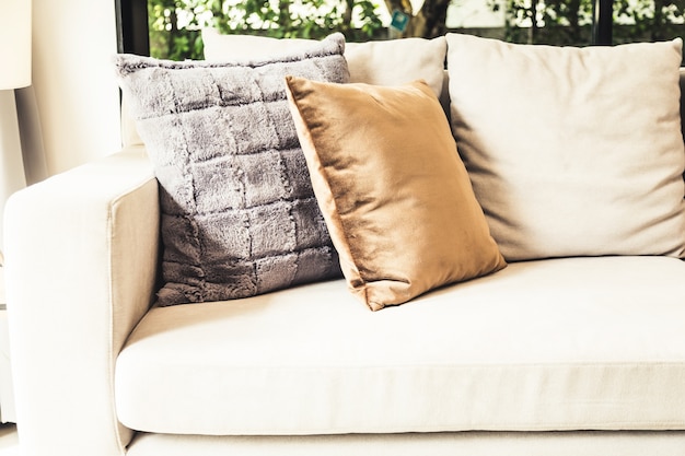 Photo contemporary interior of living room with part of sofa in sunny day