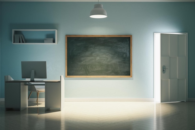 Contemporary workplace in home office with computer on table and blank blackboard