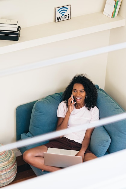 Content African American lady using devices at home