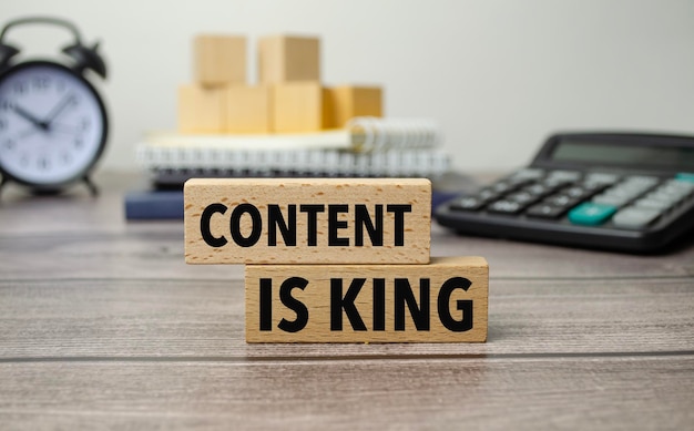 Content is king is shown on a conceptual photo using wooden blocks