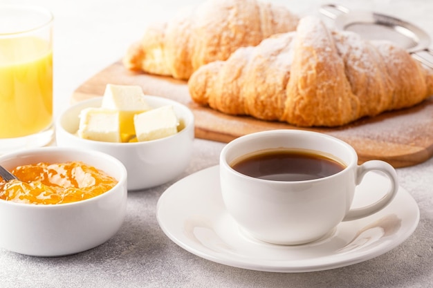 Continental breakfast with fresh croissants orange juice and coffee