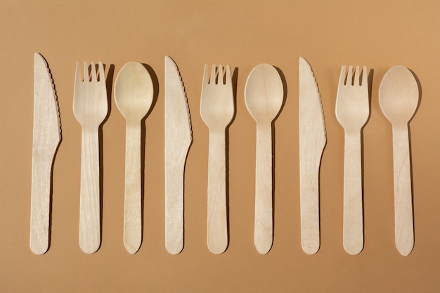 Contrast lighting Flat lay Eco friendly wooden cutlery Fork and knife Plastic Free Concept