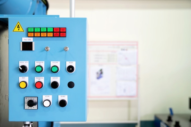 Control panel of an automatic machine in the manufacturing factory.