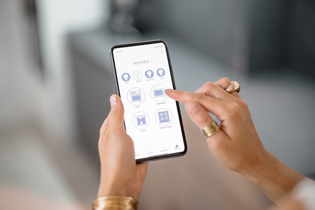 Controlling smart devices with phone on the kitchen