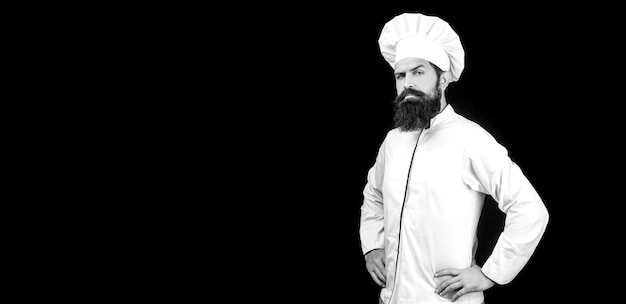 Cook hat Serious cook in white uniform chef hat Portrait of a serious chef cook Black and white