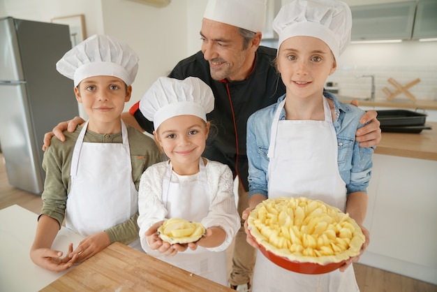 Cook with his students