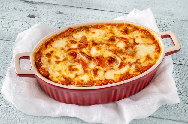 Cooked Eggplant Parmigiana In Baking Pan Close-up