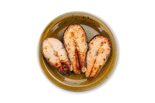 cooked fish on a plate on a white background