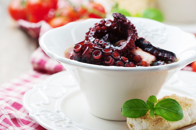 Cooked octopus with bread