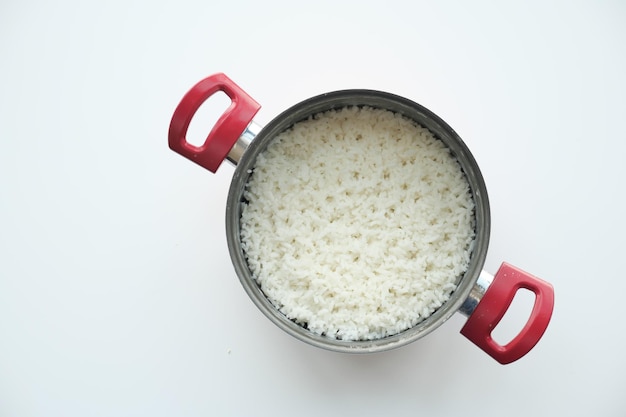 Cooked rice in a bowl on white background