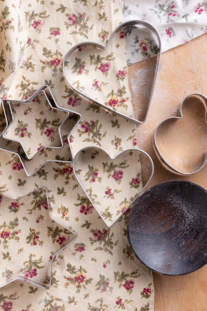 Cookies cutter on wooden table