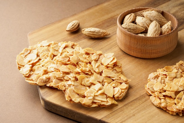 Cookies made of almond petals Cookies and almonds on the board