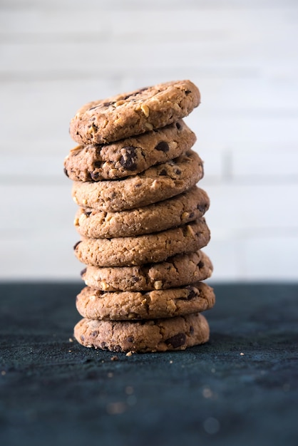 Cookies with chocolate chips and hazelnuts, made with oatmeal and wheat flour.