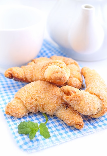 Cookies with jam on a white plate on a white background