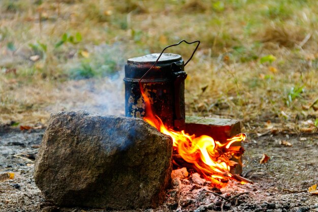 Cooking on campfire in camping