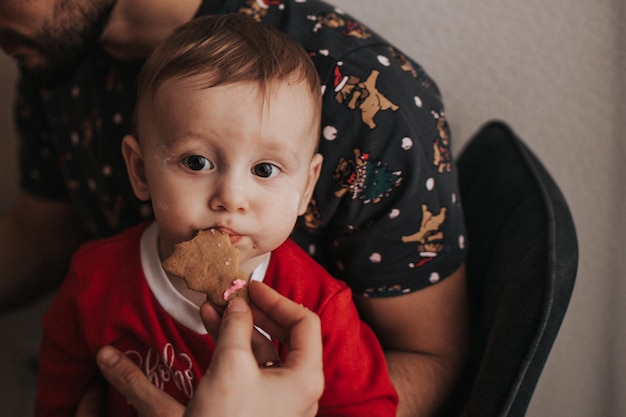 Cooking christmas cookies with icing family