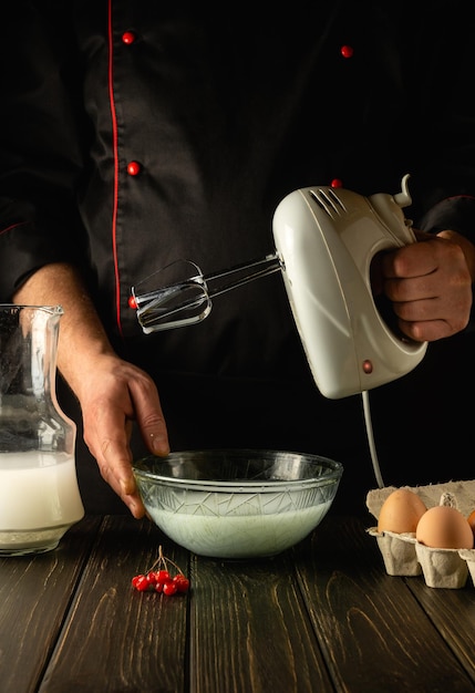 Cooking egg omelette with milk using an electric hand mixer