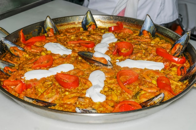 Cooking an exquisite seafood paella