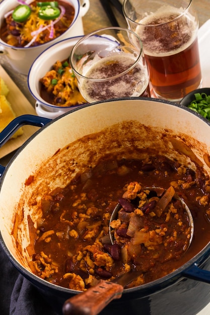 Cooking homemade turkey chili for dinner.