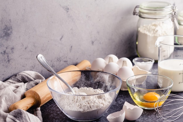 Cooking ingredients for dough eggs flour sugar milk