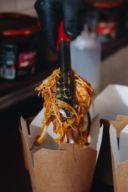 Cooking Japanese noodles with chicken