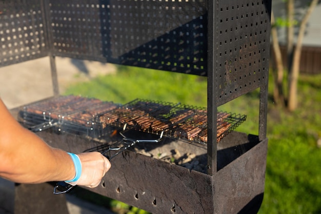 cooking meat grill on fire on the grate