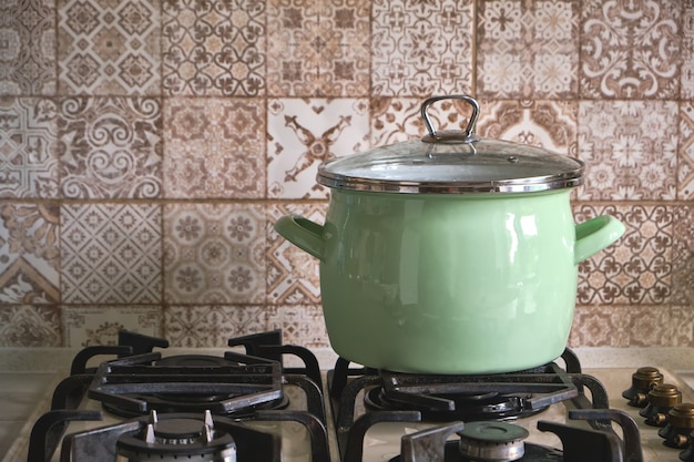 Cooking pot on gas stove in the home kitchen