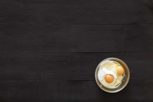 cooking recipe ingredients on a black background