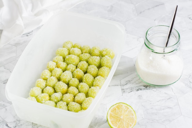 Cooking sour candy grapes and ingredients on the table Social media candy trend