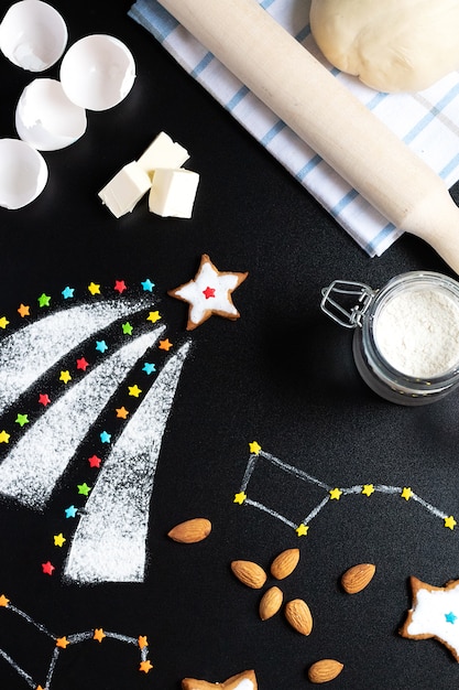 cooking star cookies on black table