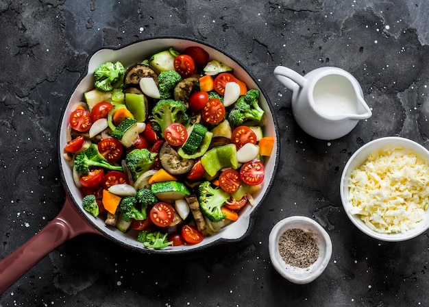 Cooking vegetarian casserole ratatouille baked in a frying pan