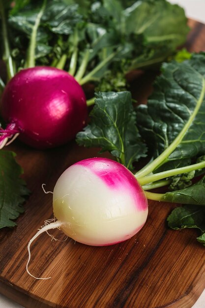 Cooking with radishes fresh radish with leaves on a cutting board