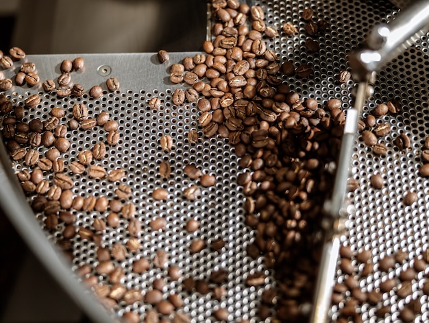 Cooling tray with freshly roasted coffee beans